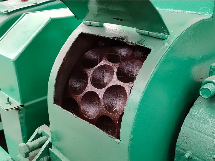 Close‑up detail display of ball press machine mould